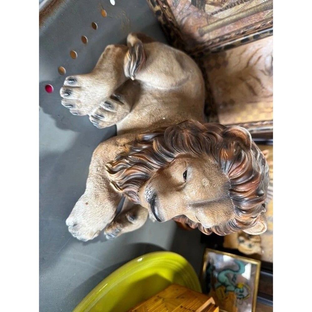 vintage resting lion figurine